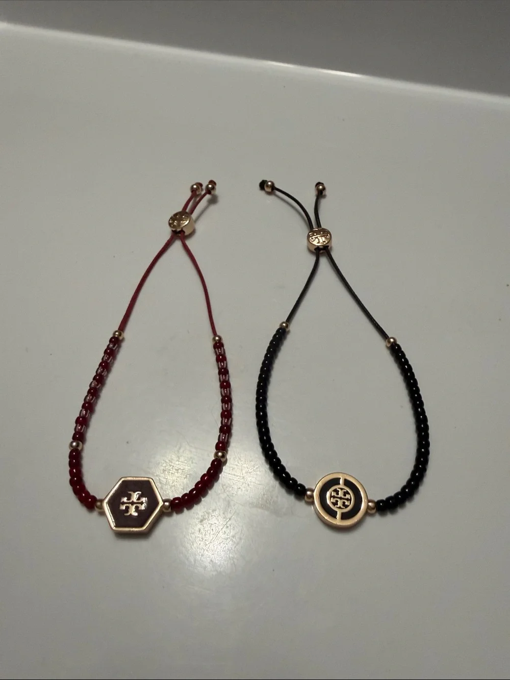 TWO Tory Burch Adjustable Beaded BraceletS - Red and Black